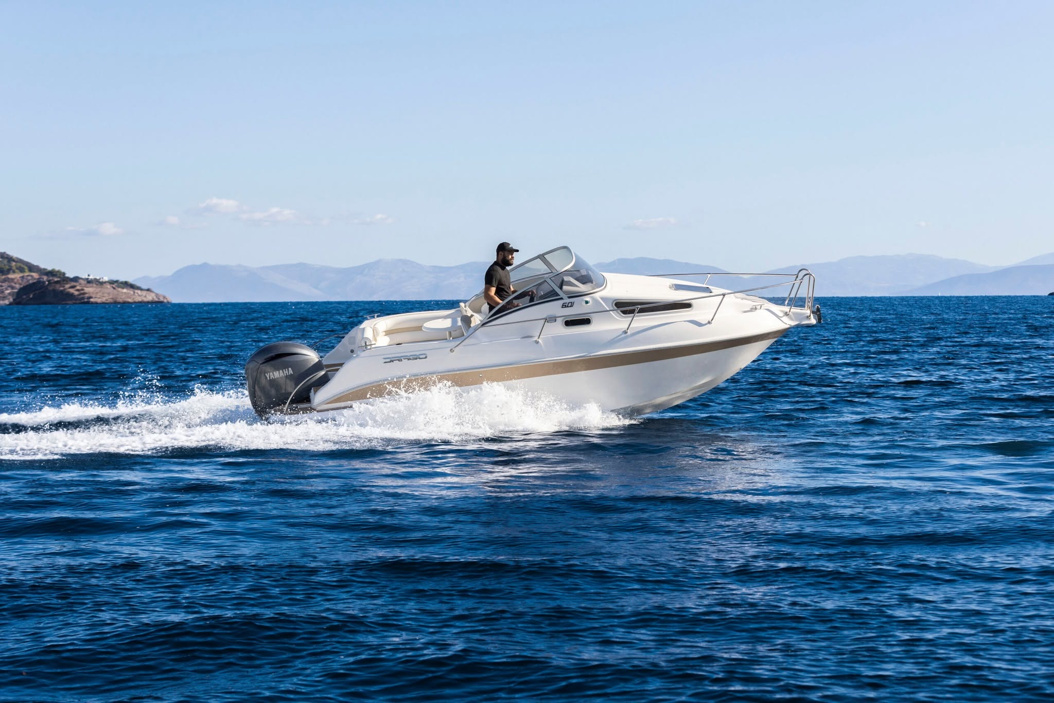 Drago 601 day boat underway on open water